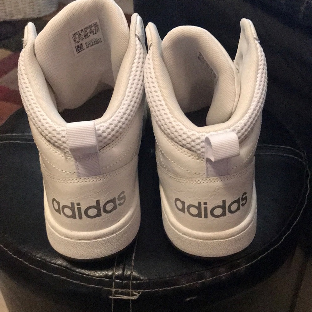 White women Adidas shoes. Wore only once. Brought from Adidas store.